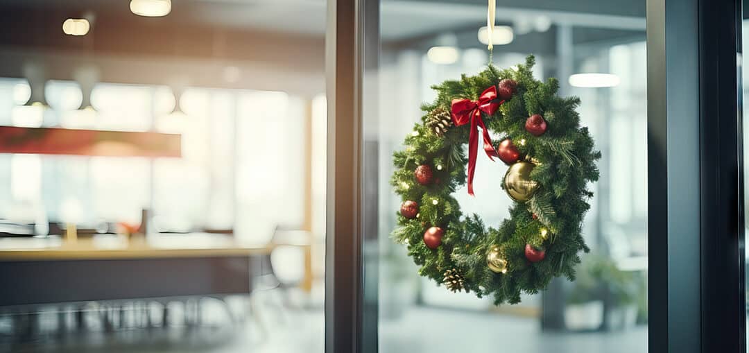 Holiday wreath on the exterior of partitioned office